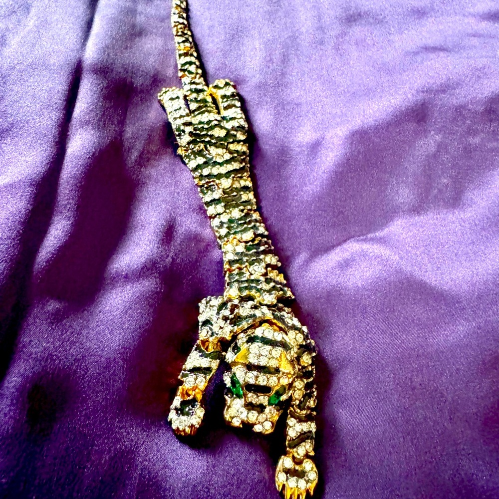 Vintage  articulated tiger brooch, circa 1980, enamel and rhinestones.